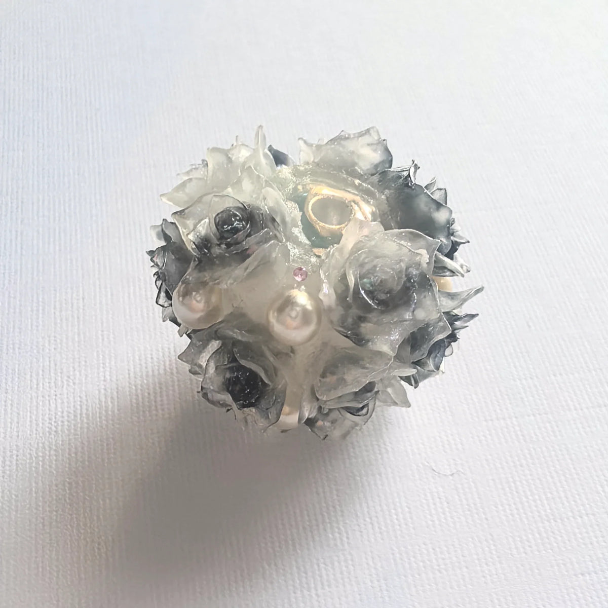 Black rose flower ball bead with dark rose petals, pearl-like accents and a threading hole.