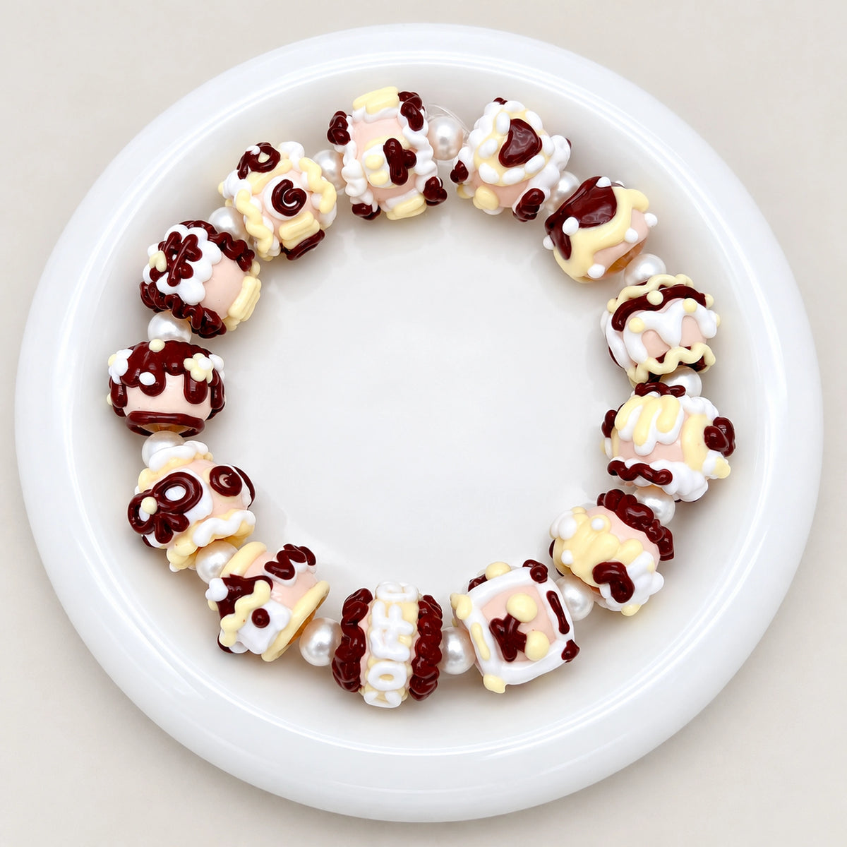 DIY beaded bracelet inspiration featuring black and white chocolate inspired beads with pearl spacers