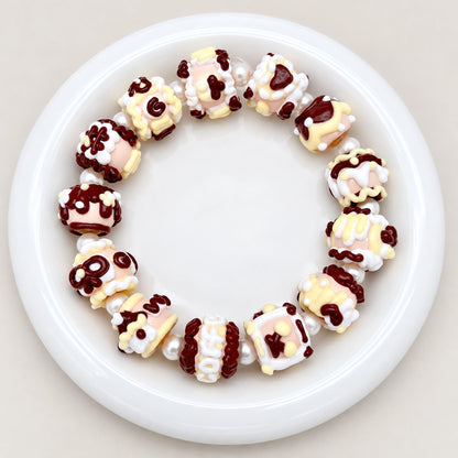 DIY beaded bracelet inspiration featuring black and white chocolate inspired beads with pearl spacers