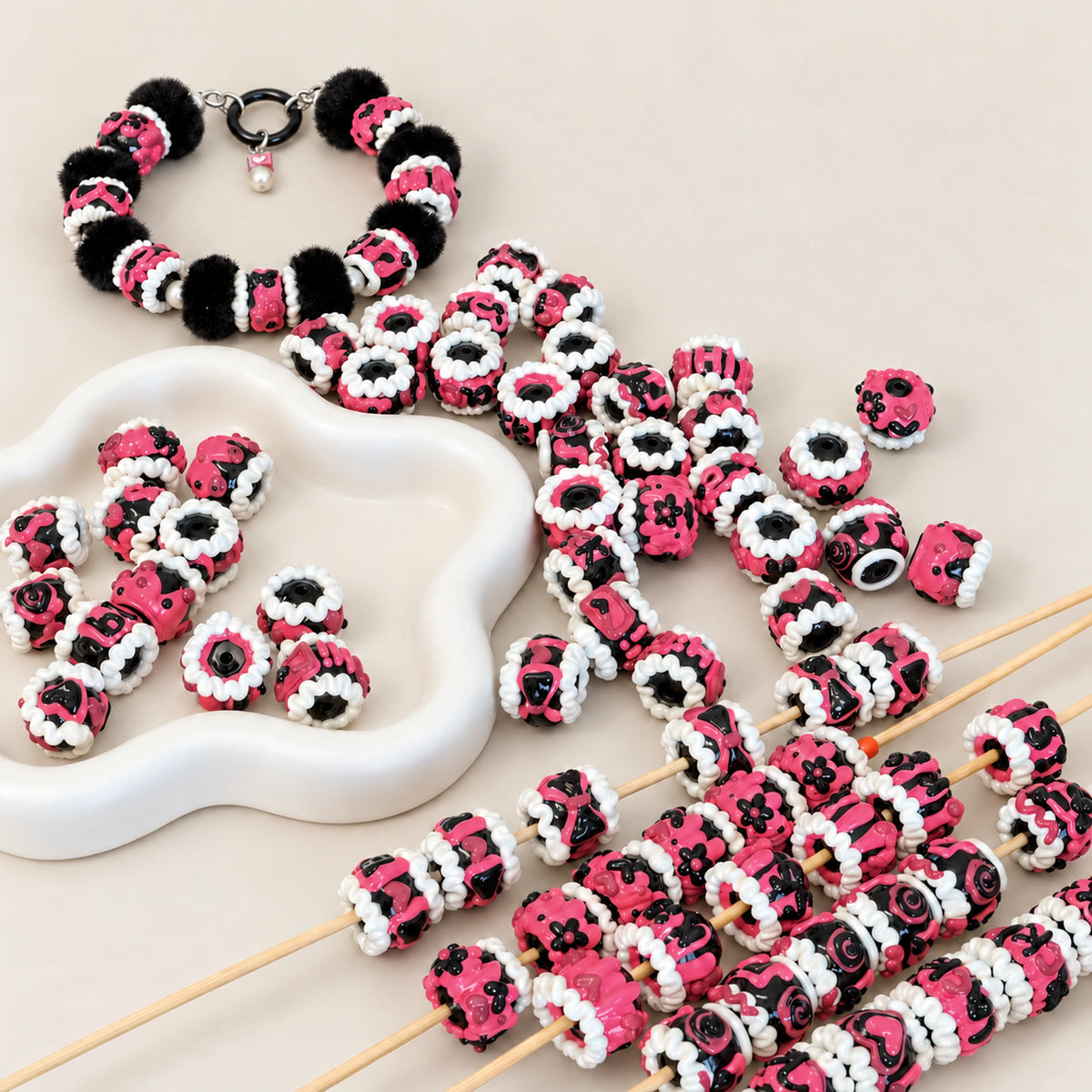 Midnight fuchsia 3D beads displayed with finished handmade beaded charm inspiration