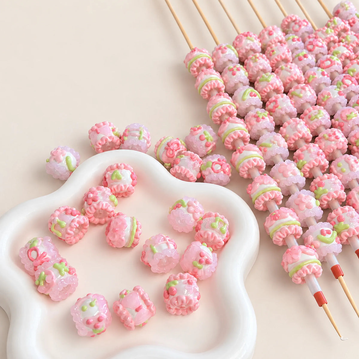 Spring blush and mint handmade 3D beads in soft pink and green, assorted patterns and center holes